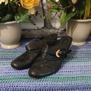 Elegant Black Mules with Gold Accent